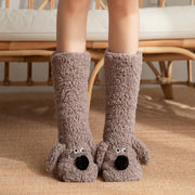 Cute gray plush cartoon dog floor socks for women, providing warmth and comfort with non-slip design for winter wear.