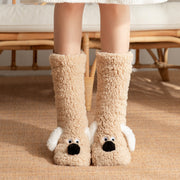 Cute plush cartoon dog floor socks for women, featuring a non-slip design, perfect for winter warmth and comfort.