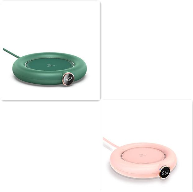 Two USB cup warmer pads in green and pink with LED temperature display. Adjustable temperature for beverages.